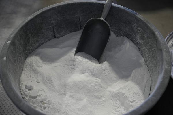 A container of lithium carbonate sits in a shipping warehouse.