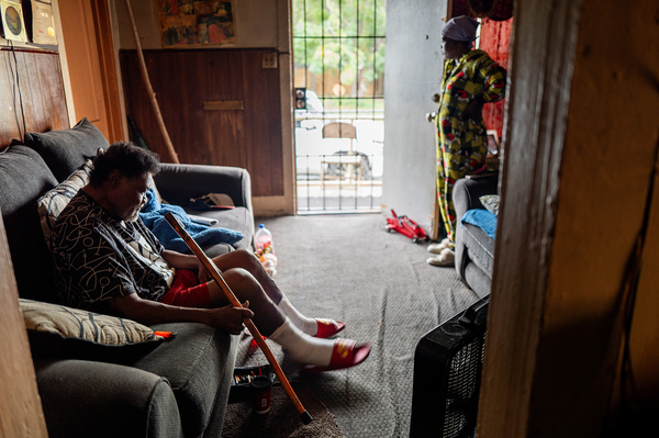 Larry Nelson, 71, rests on a couch in his Houston home on July 12. Texas. 