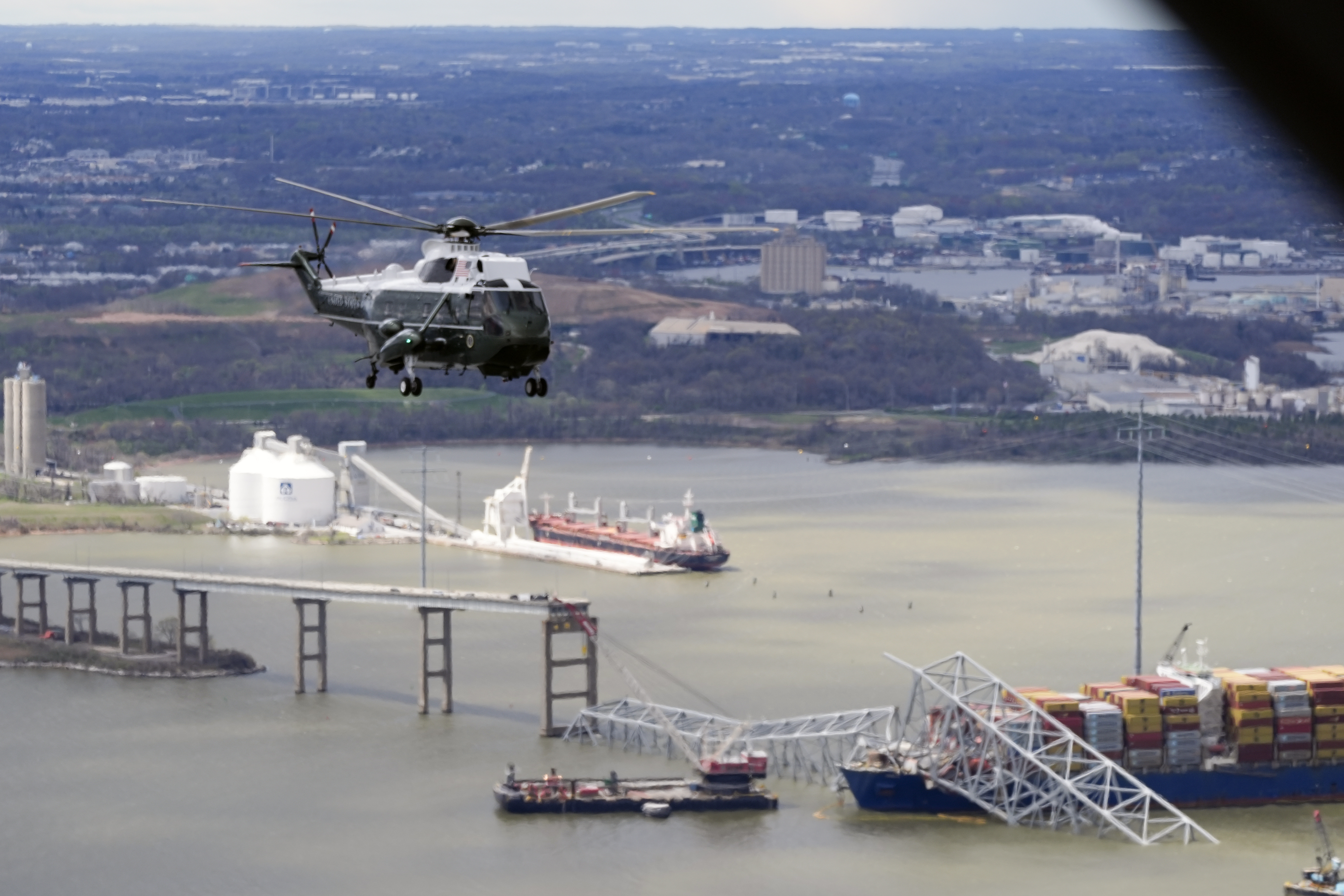 President Joe Biden, aboard Marine One, takes an aerial tour of the collapsed Francis Scott Key Bridge in Baltimore, April 5, 2024, as seen from an accompanying aircraft. 